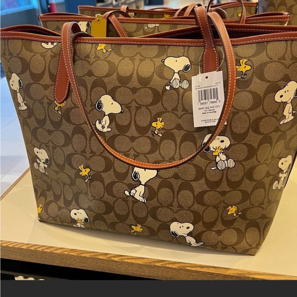 Coach X Peanuts City Tote in signature canvas with Snoopy Woodstock print